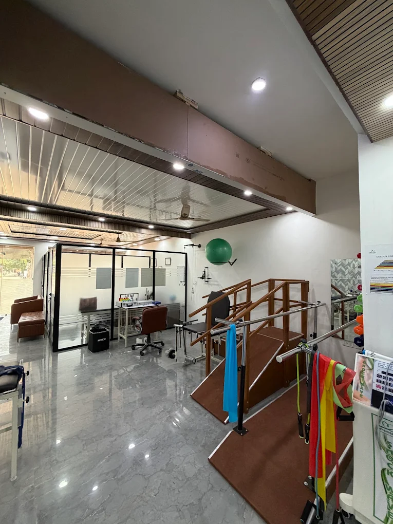PhysioSewa treatment area with therapy beds and privacy curtains